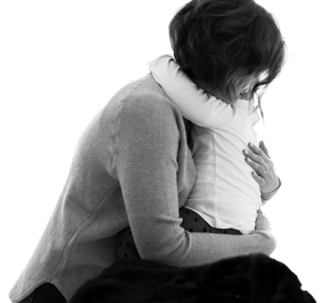 A parent and child embracing