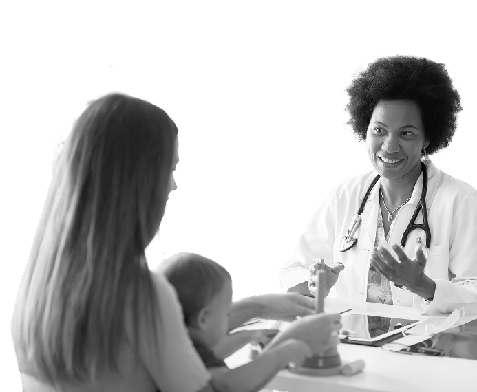 Pediatrician speaking with a parent and child